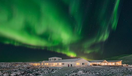 Northern lights over Northern Lights inn in South Iceland