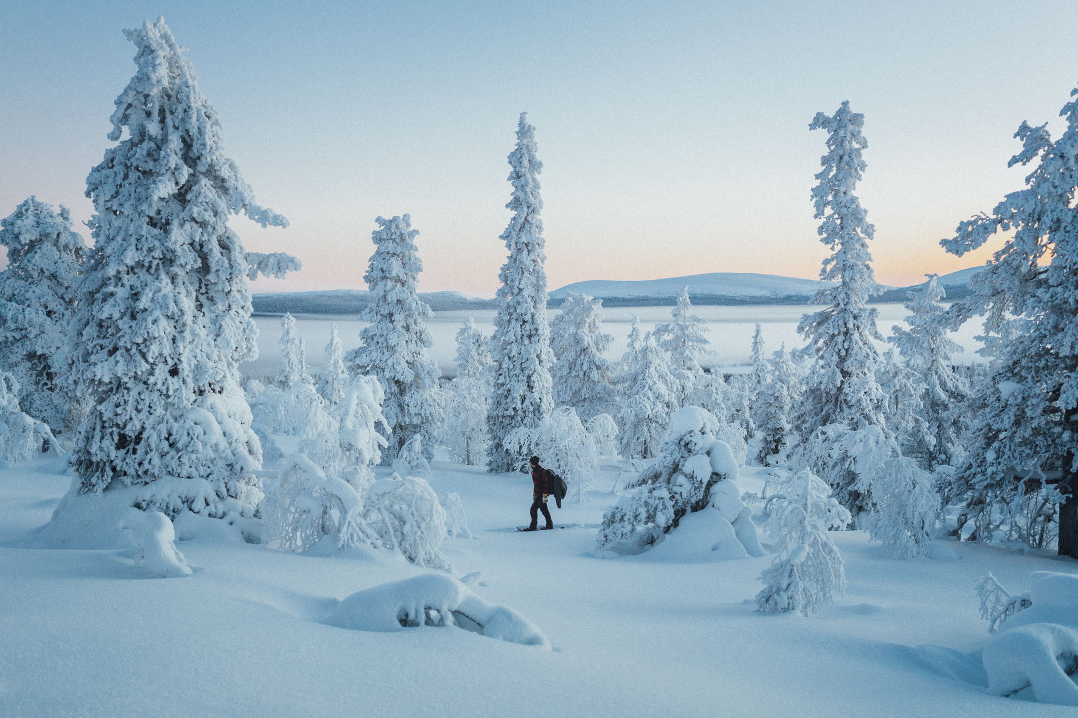 Snowshoeing at Arctic Snow hotel in winter