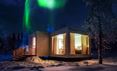 Northern lights outside Sky view cabins at Northern lights ranch in Finland