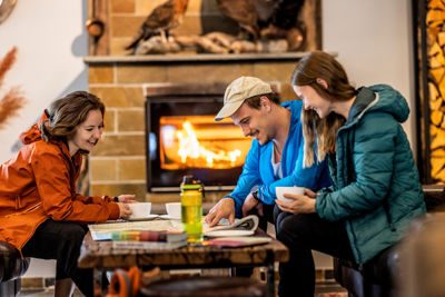 Young People Looking At The Map For Finding Tracks Sagafjord Hotel Classic Norway Hotels RAISFOTO