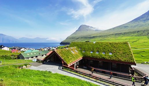 Summer view of Gjaargardur Guesthouse in the Faroe Islands