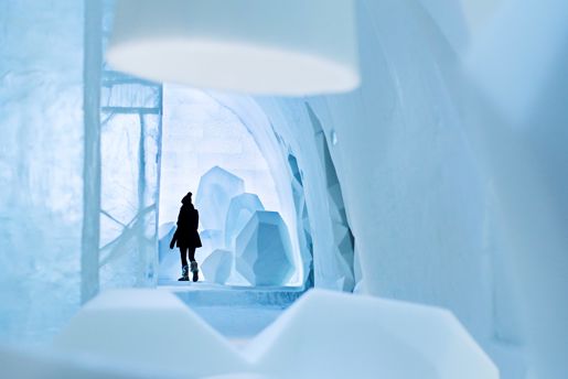 Person in the main hall at the icehotel in swedish lapland