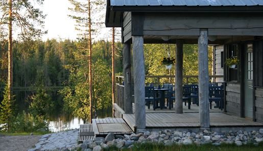 Accommodation and lake at the Bear Centre, East Finland. 